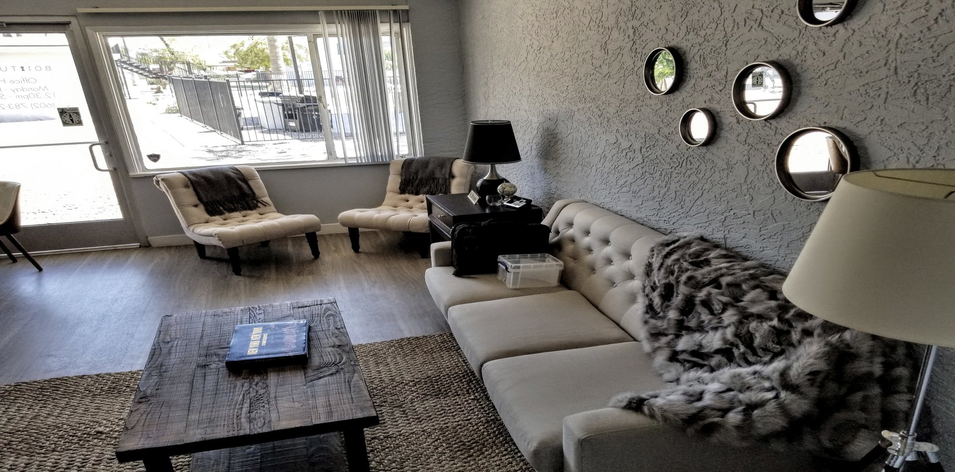 Furnished apartment living area shown at 801 Turney.
