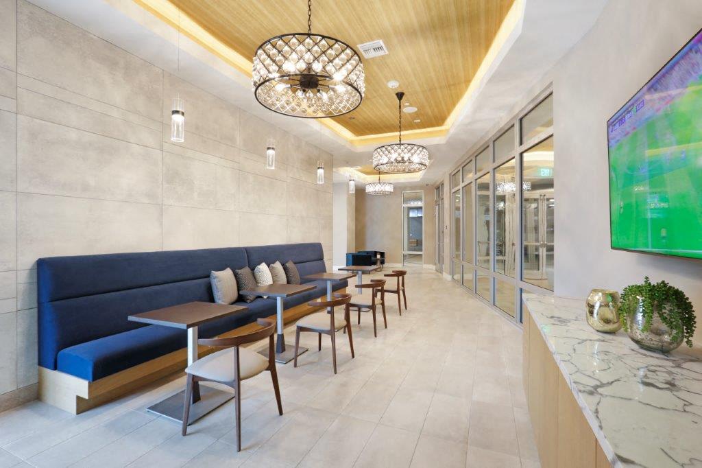 One Uptown lobby with tables and chairs