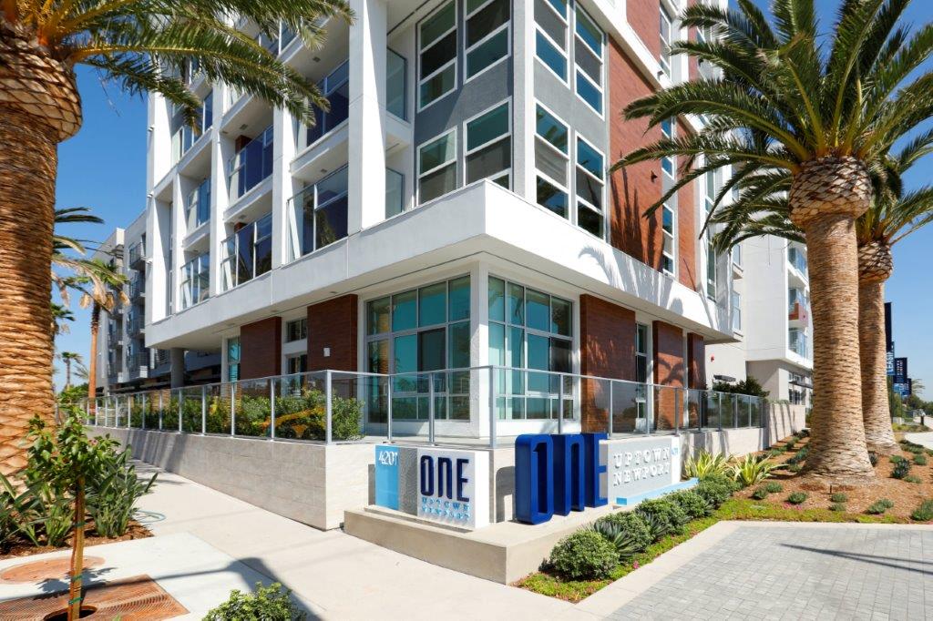 Corner of Jamboree with the entrance to the luxury apartments