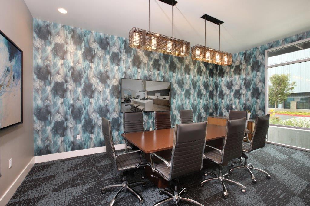 Conference room with a wooden table and chairs