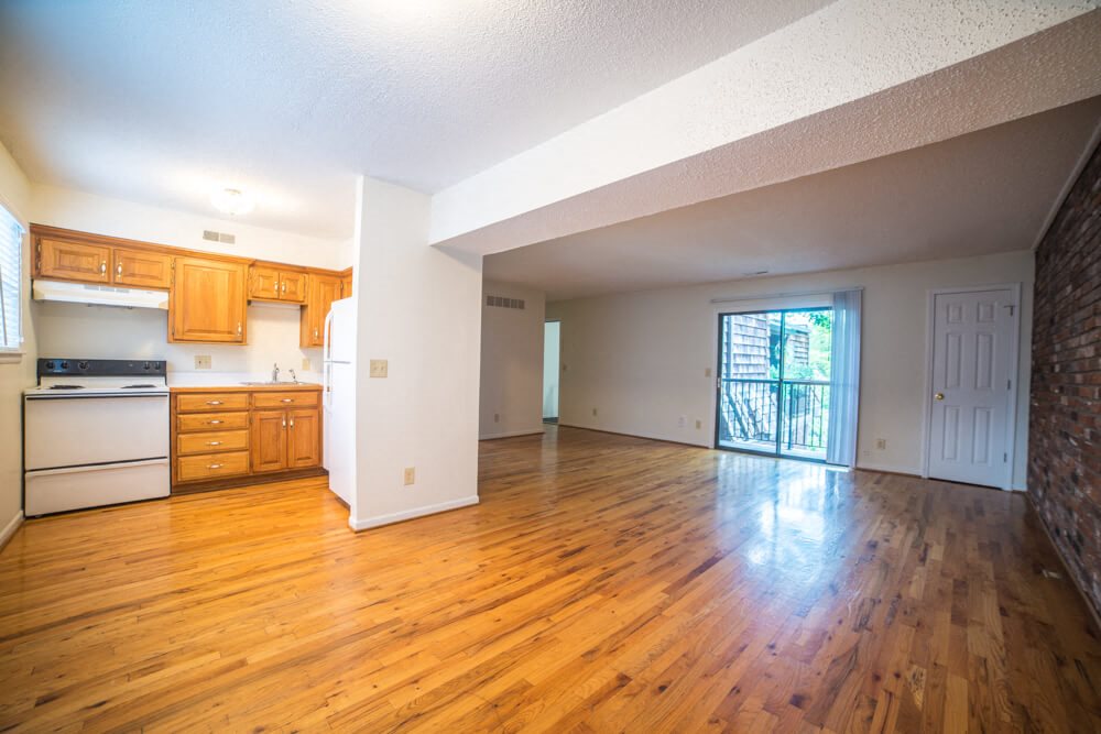 Spacious living room with hardwood floors