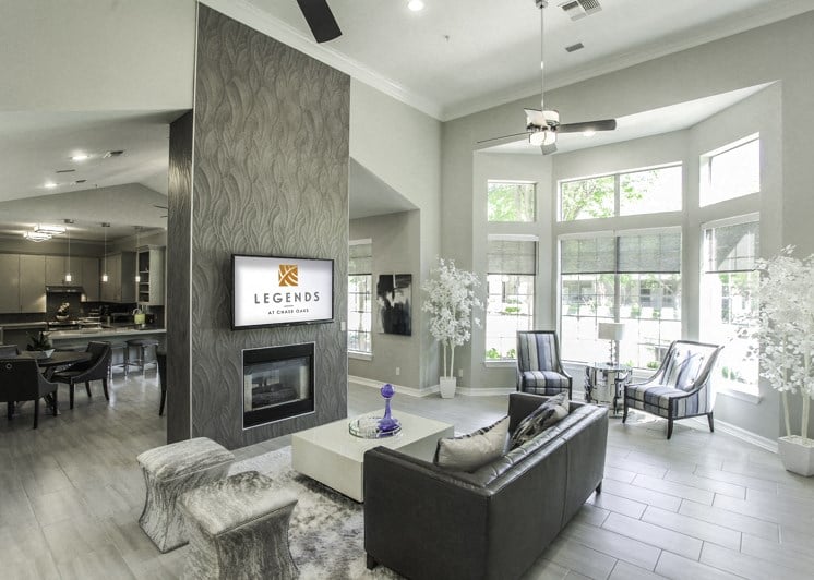 Legends at Chase Oaks Resident Clubhouse with Seating Area and Fireplace