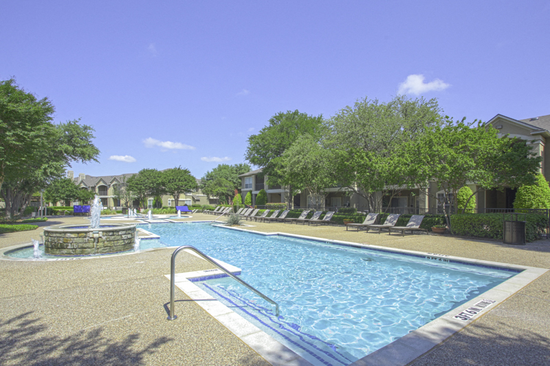 Take a dip in the stunning resort-style pool with tanning lounge chairs